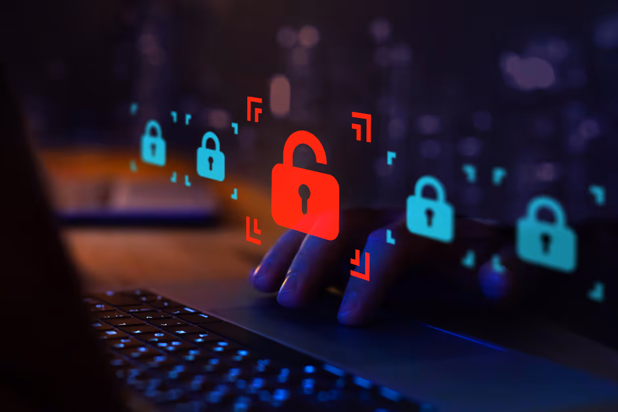 Cadenas rouge parmi des cadenas cyan sur un clavier